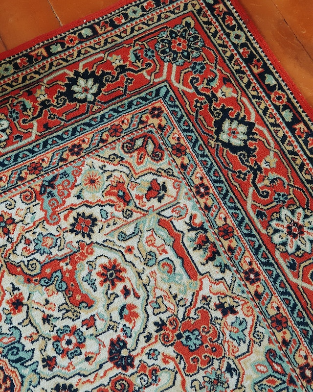 Tips for choosing the right size and shape of a blue western rug for specific areas